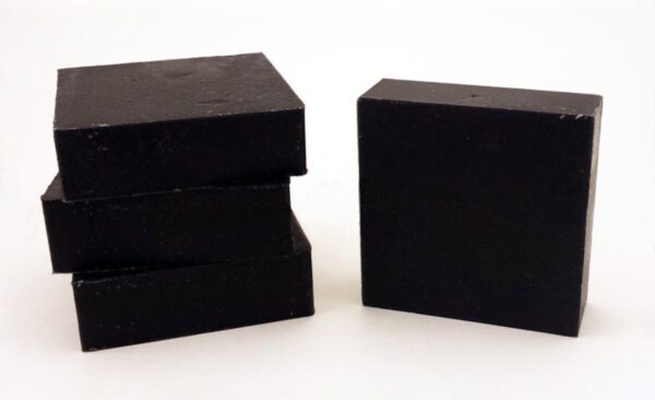 Four black bar soaps