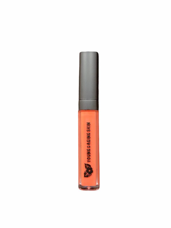 A container of corrective liquid concealer in an orange shade