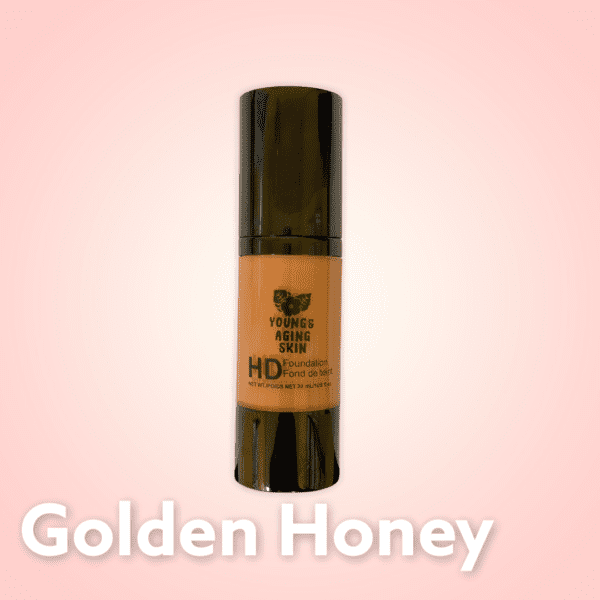 A container of a liquid foundation in Golden Honey shade