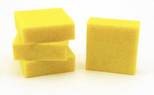 Four yellow bar soaps