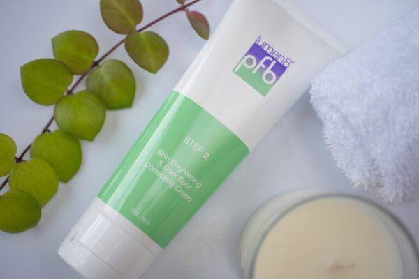 A tube of a skin brightening and dark spot correcting cream